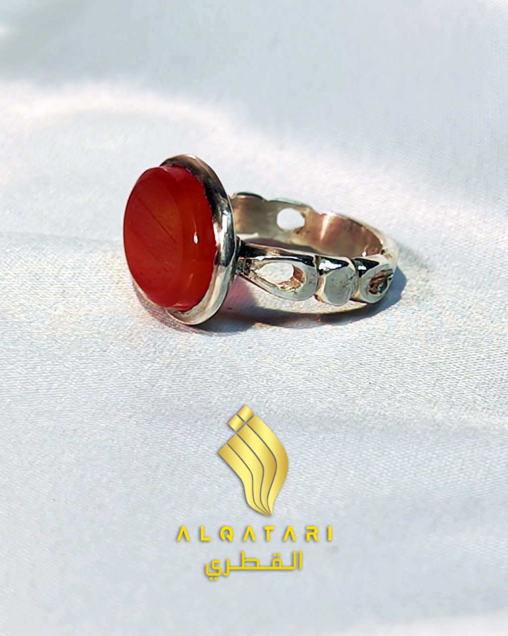 Side view of silver Islamic ring with red aqeeq agate stone and open band by Al Qatari