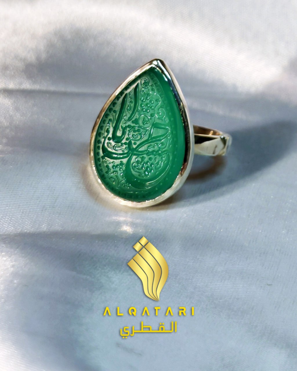 Teardrop green aqeeq agate ring with Arabic engraving "Ya Husain" and silver band by Al Qatari – front angle