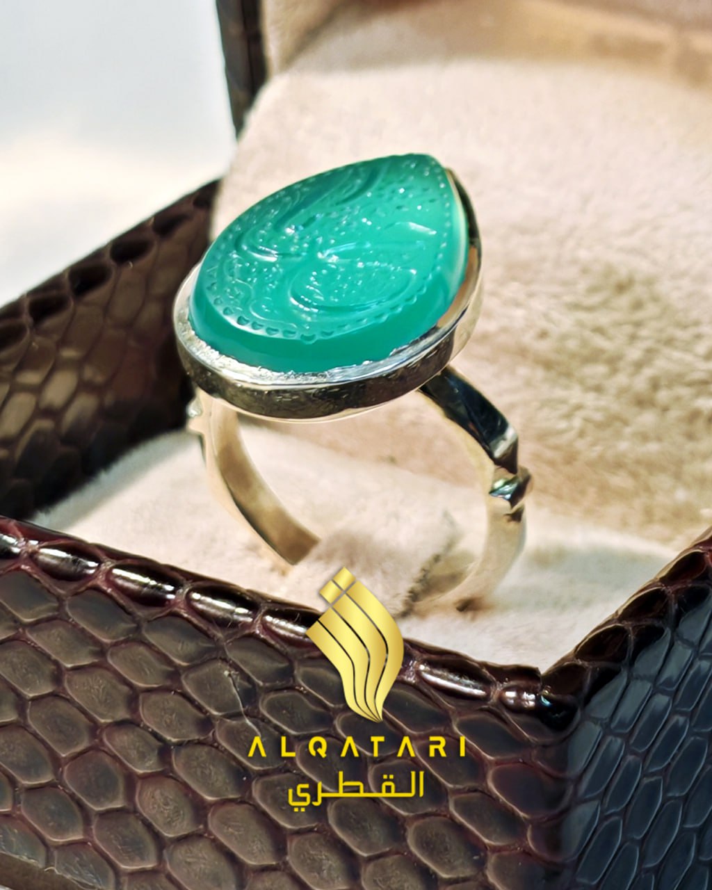 Teardrop green aqeeqagate ring with Arabic engraving on silver band by Al Qatari – front angle