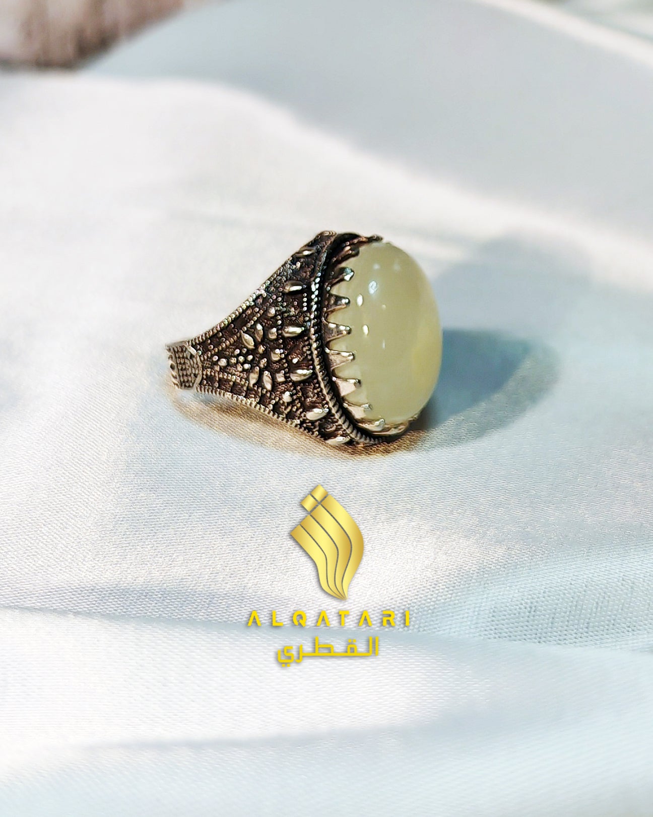 Elegant aqeeq gemstone men’s ring in vintage oxidized silver setting, showcased in luxury packaging from Al Qatari Gallery.